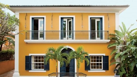 Rumah mewah tampak depan kuning butter 